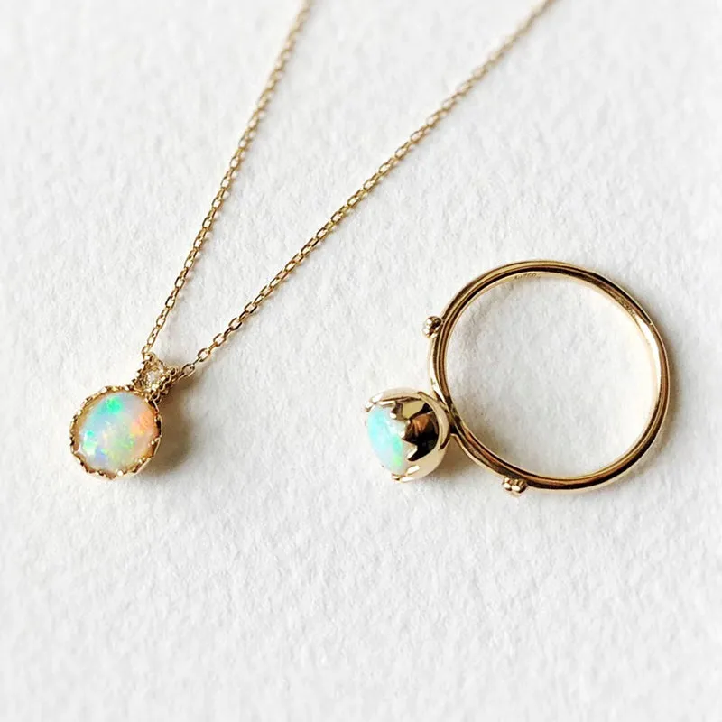 18K Gold Eggshell Shape 0.60ct Natural Opal Solitaire Ring