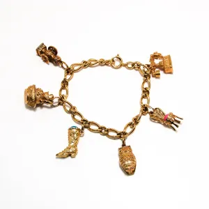 1970's 14kt Gold Plated Charm Bracelet by Avon