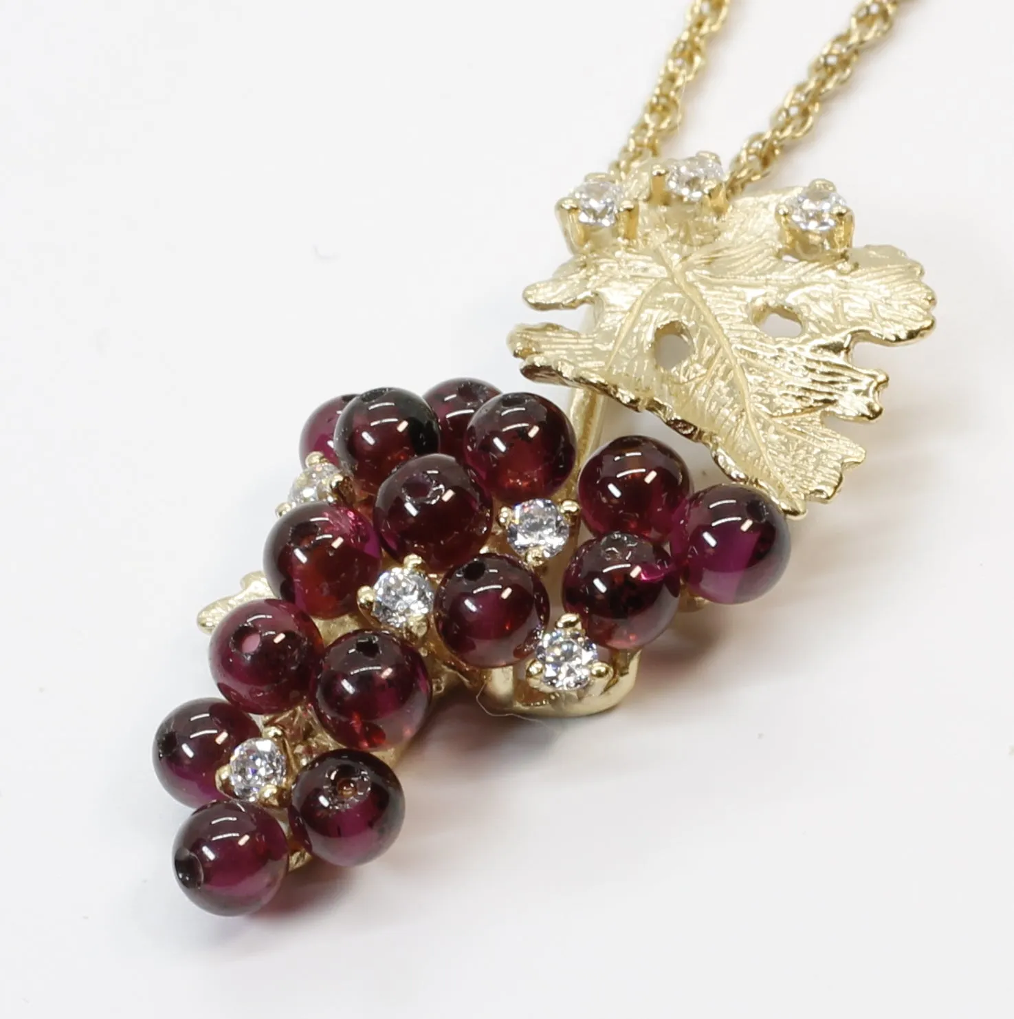 Medium Garnet Grape Necklace with Zirconia Stones and 14kt. Gold Vermeil Grape Leaf