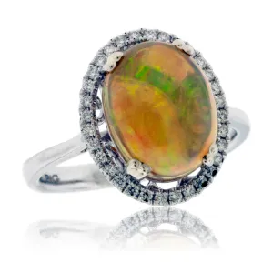 Oval Ethiopian Opal and Diamond Halo Ring